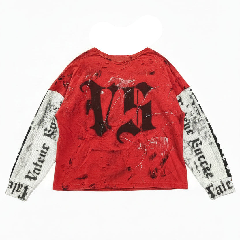 Red long-sleeve shirt with black and white designs