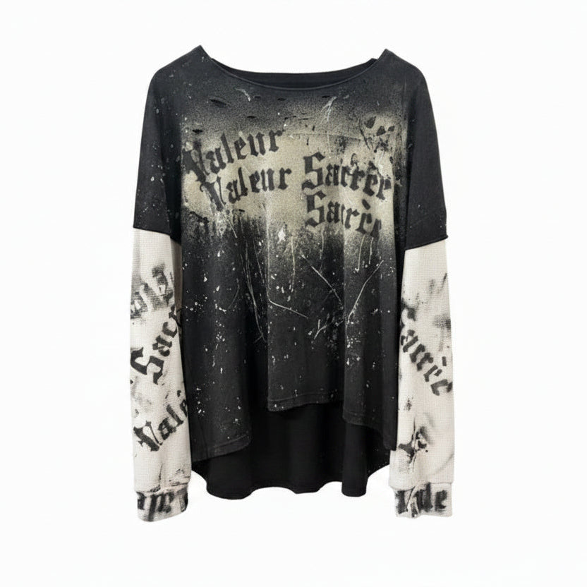 Black and white distressed sweater with text design
